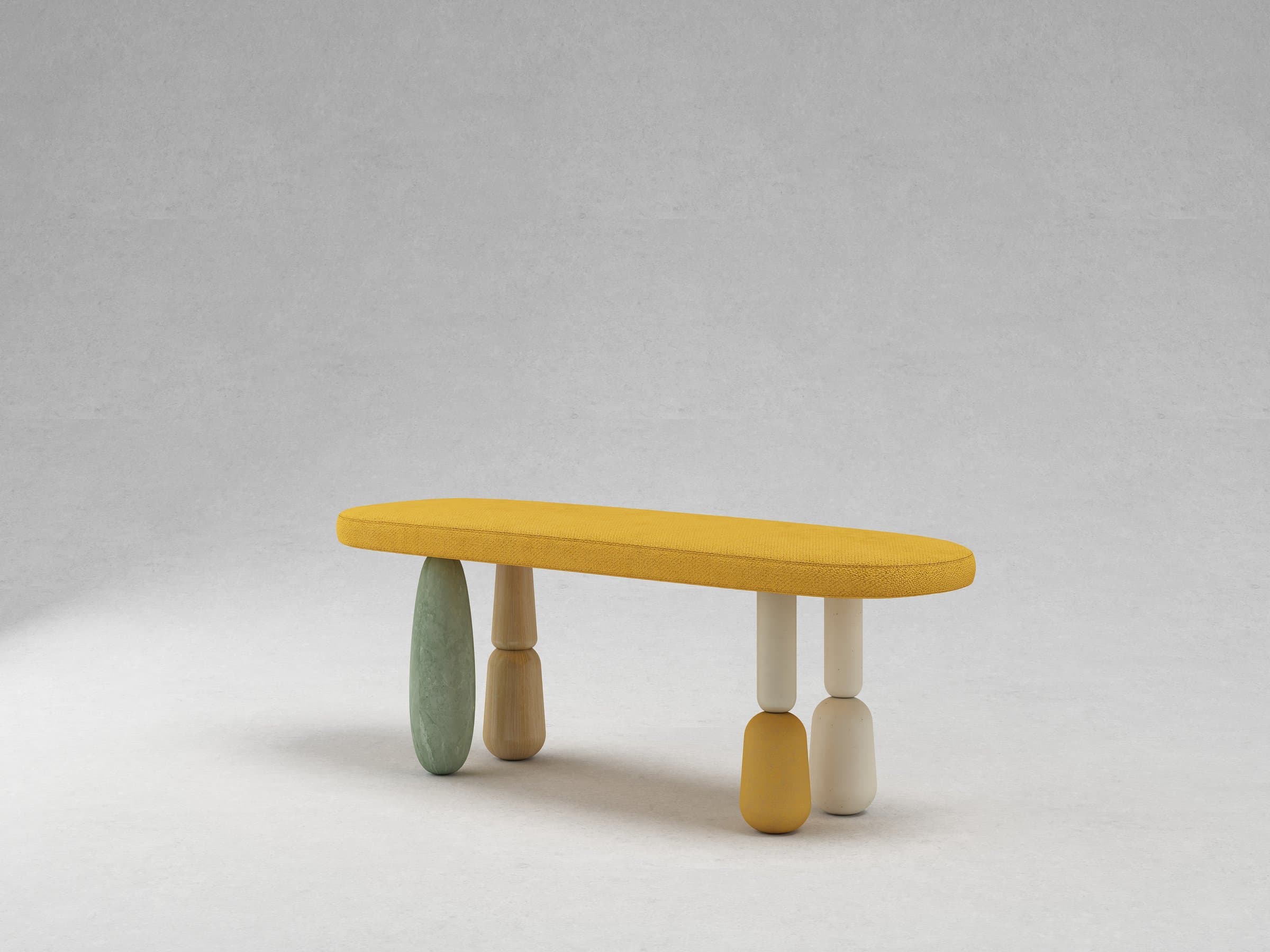Long mustard boucle bench on four mismatched pill-shaped legs in wood, green marble, ivory, and mustard — photo 2 of 3