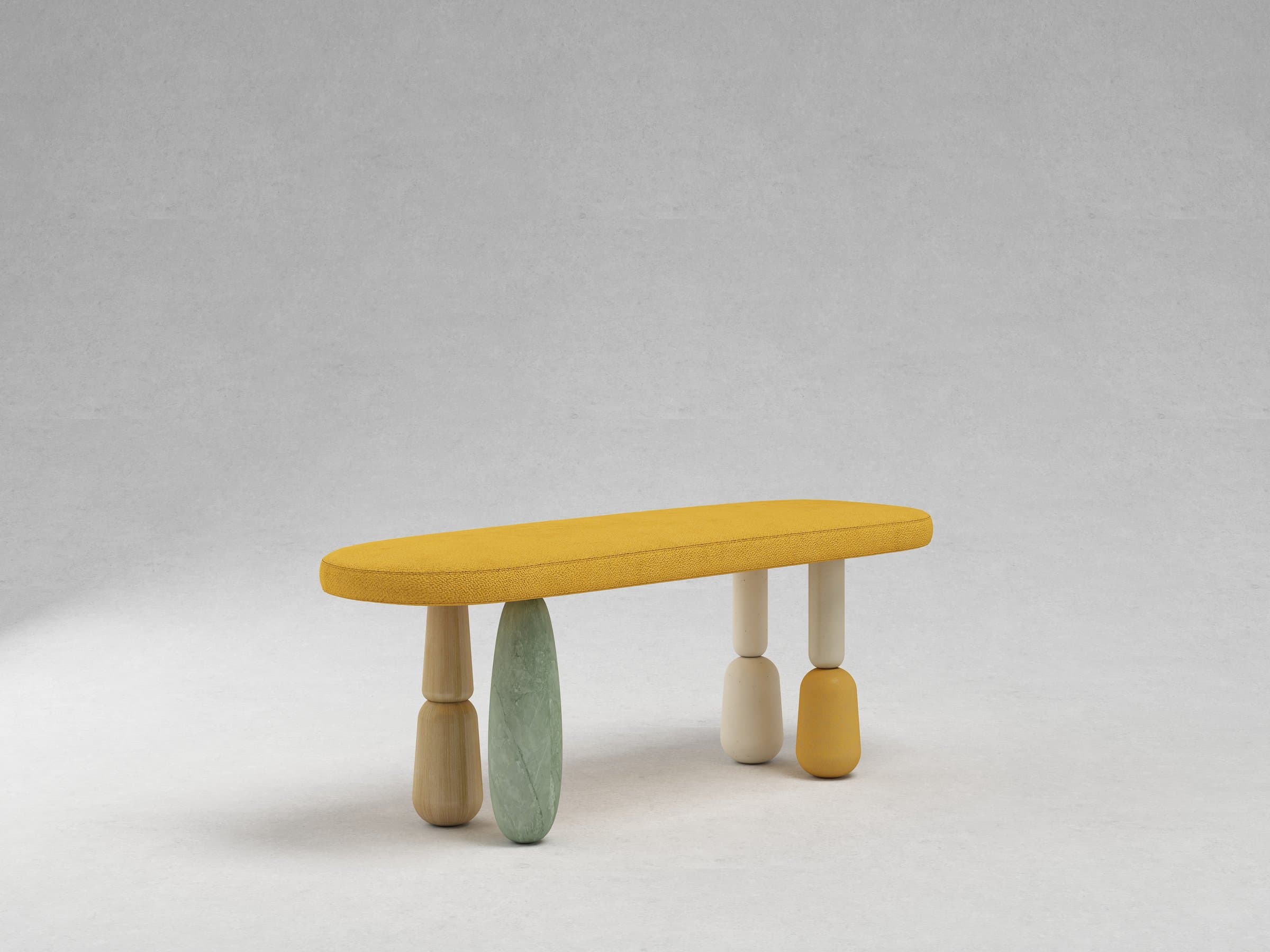 Long mustard boucle bench on four mismatched pill-shaped legs in wood, green marble, ivory, and mustard — photo 3 of 3