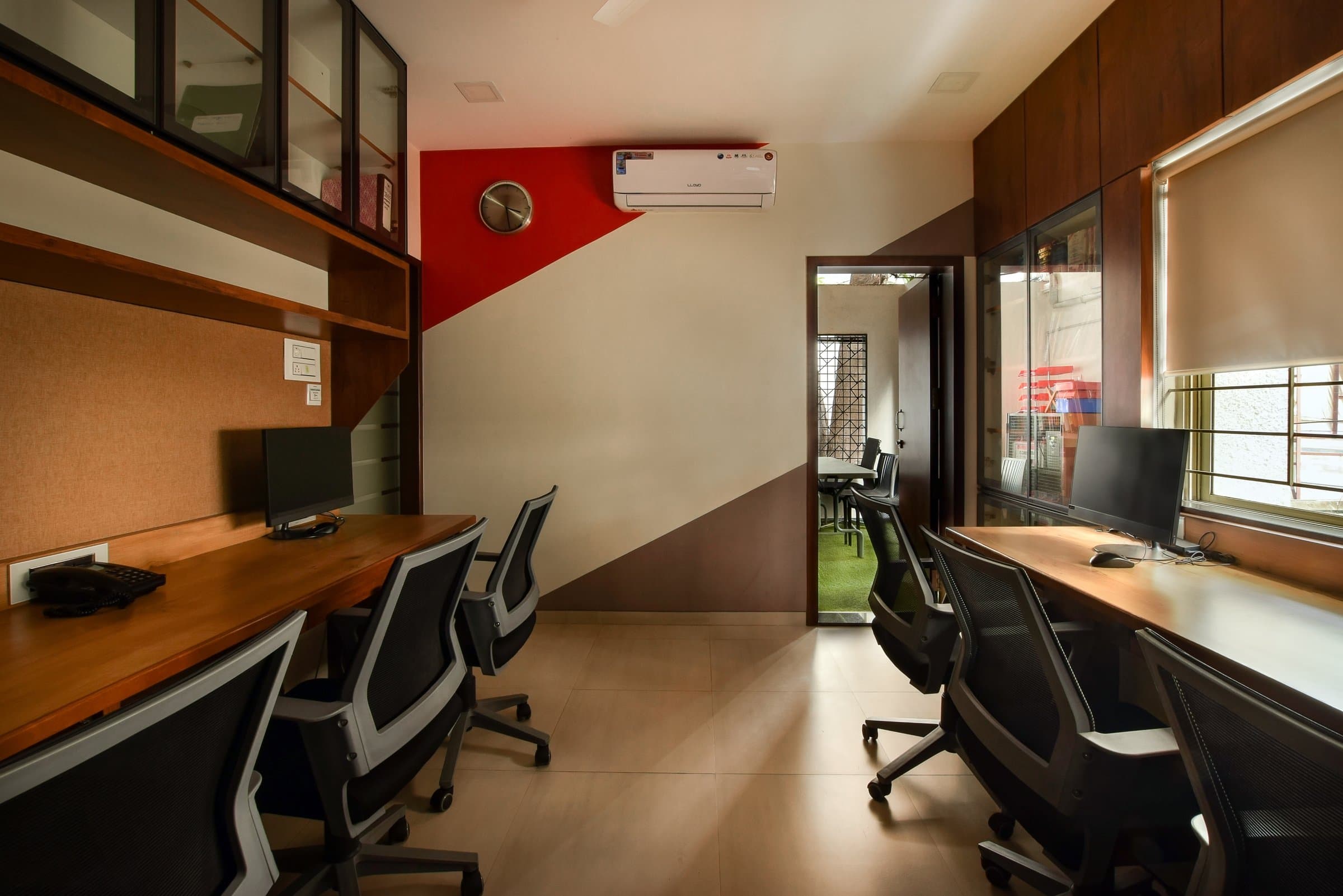 A 1,200 sq. ft. law office where bold colour replaces convention — photo 3 of 6
