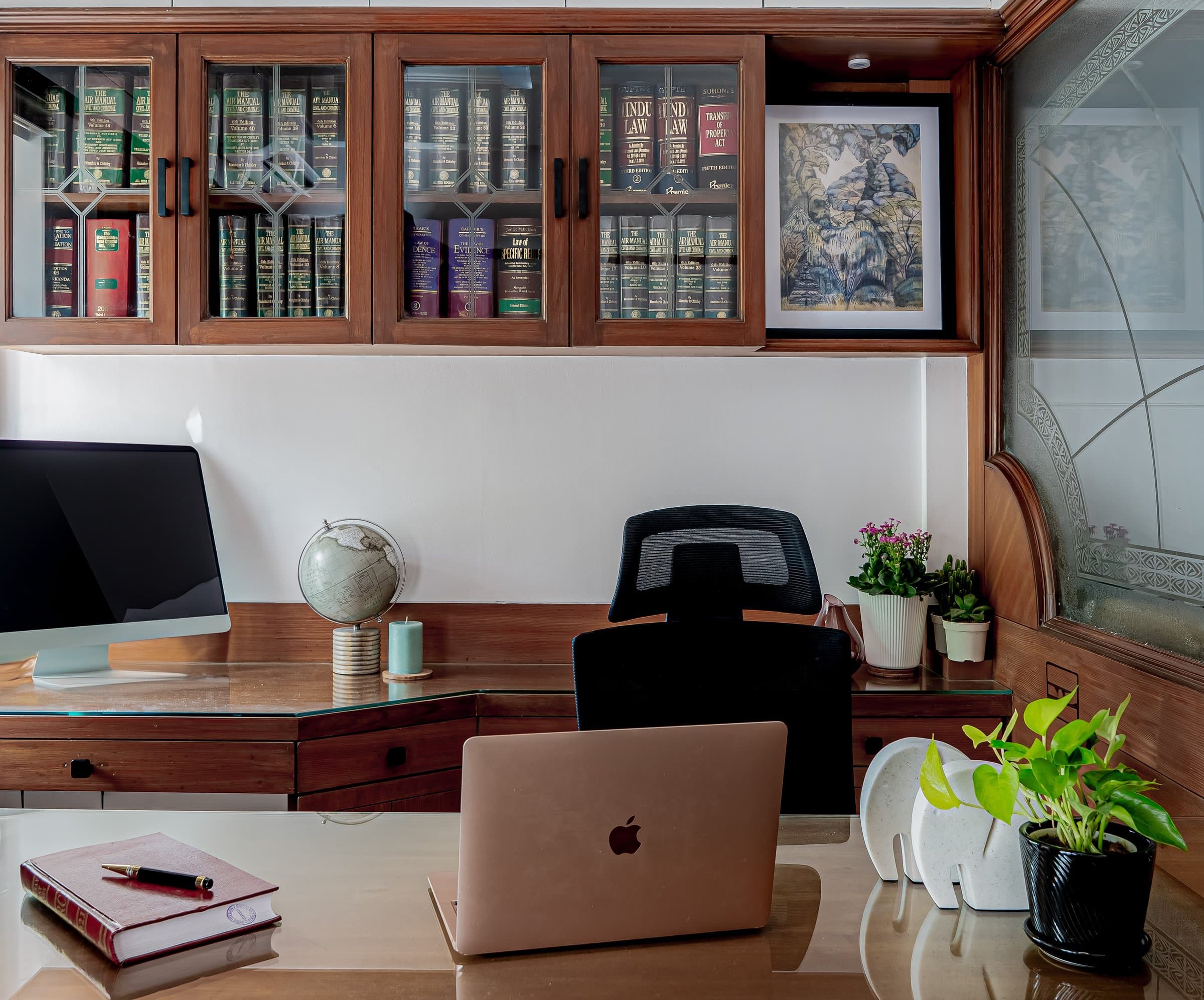A dense, book-lined chamber softened by one unexpected detail — photo 4 of 8