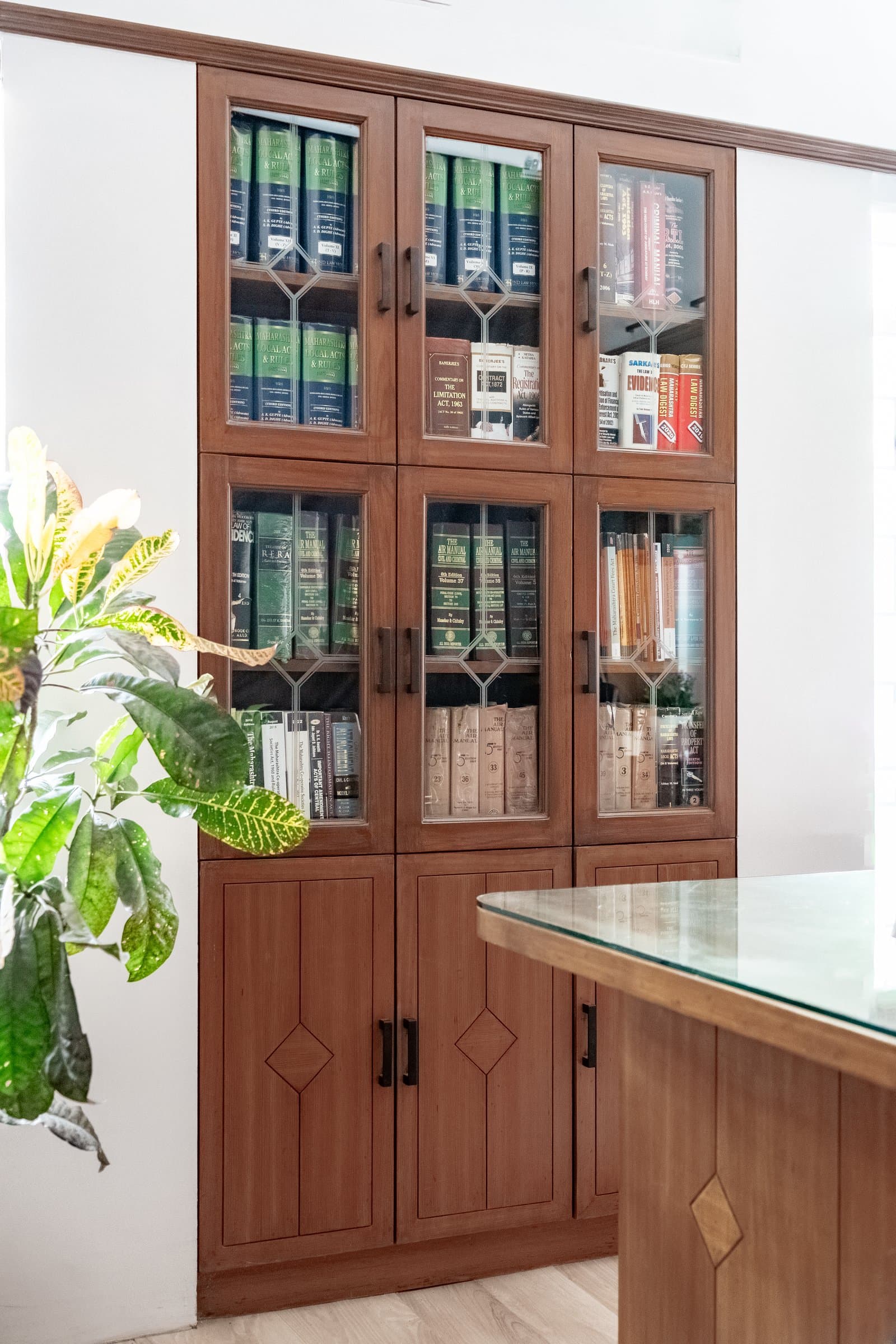 A dense, book-lined chamber softened by one unexpected detail — photo 6 of 8
