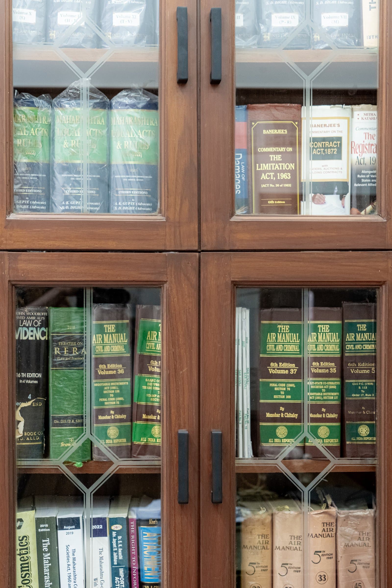 A dense, book-lined chamber softened by one unexpected detail — photo 8 of 8