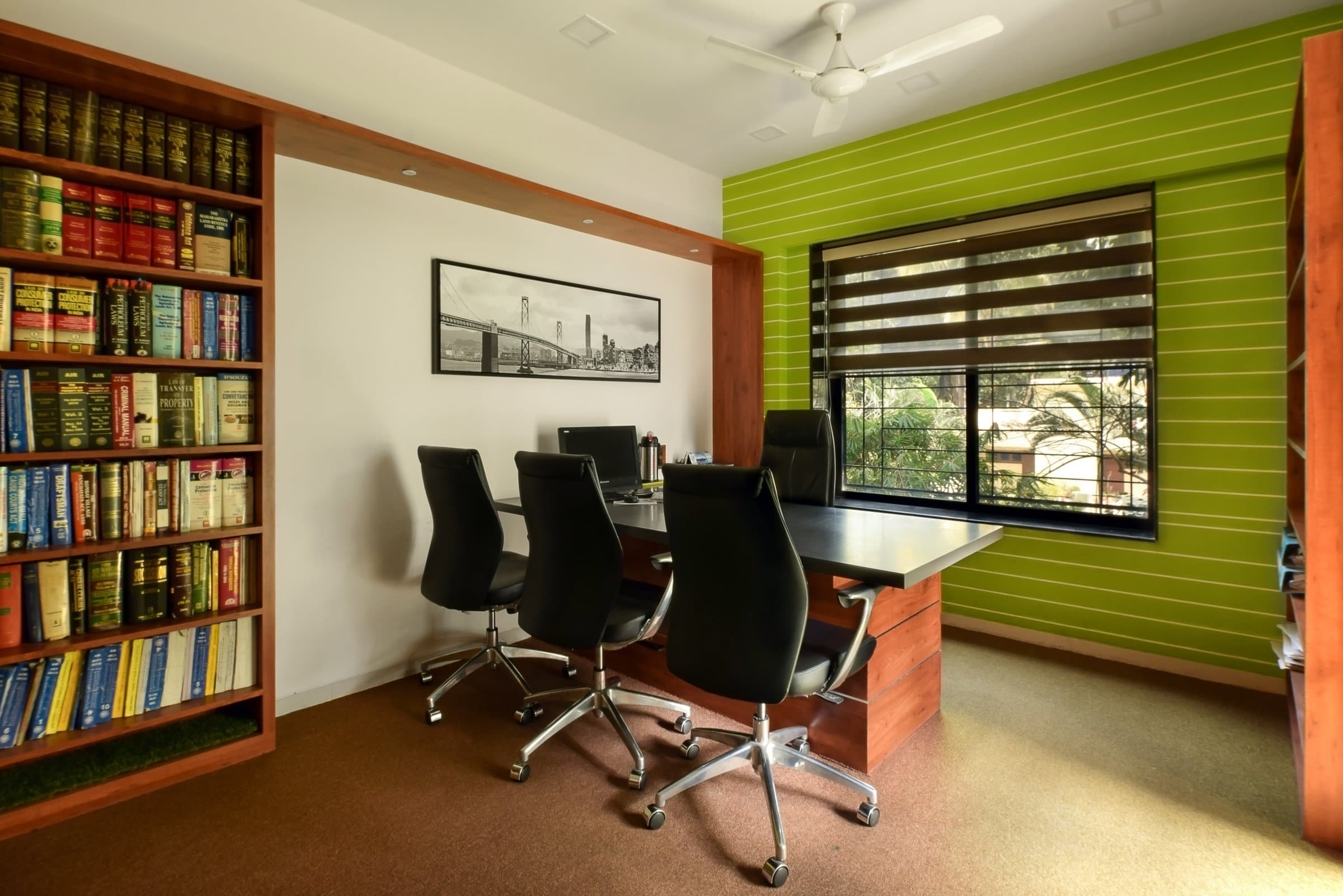 One chamber breaks from tile to carpet in this wood-slat law office — photo 3 of 8
