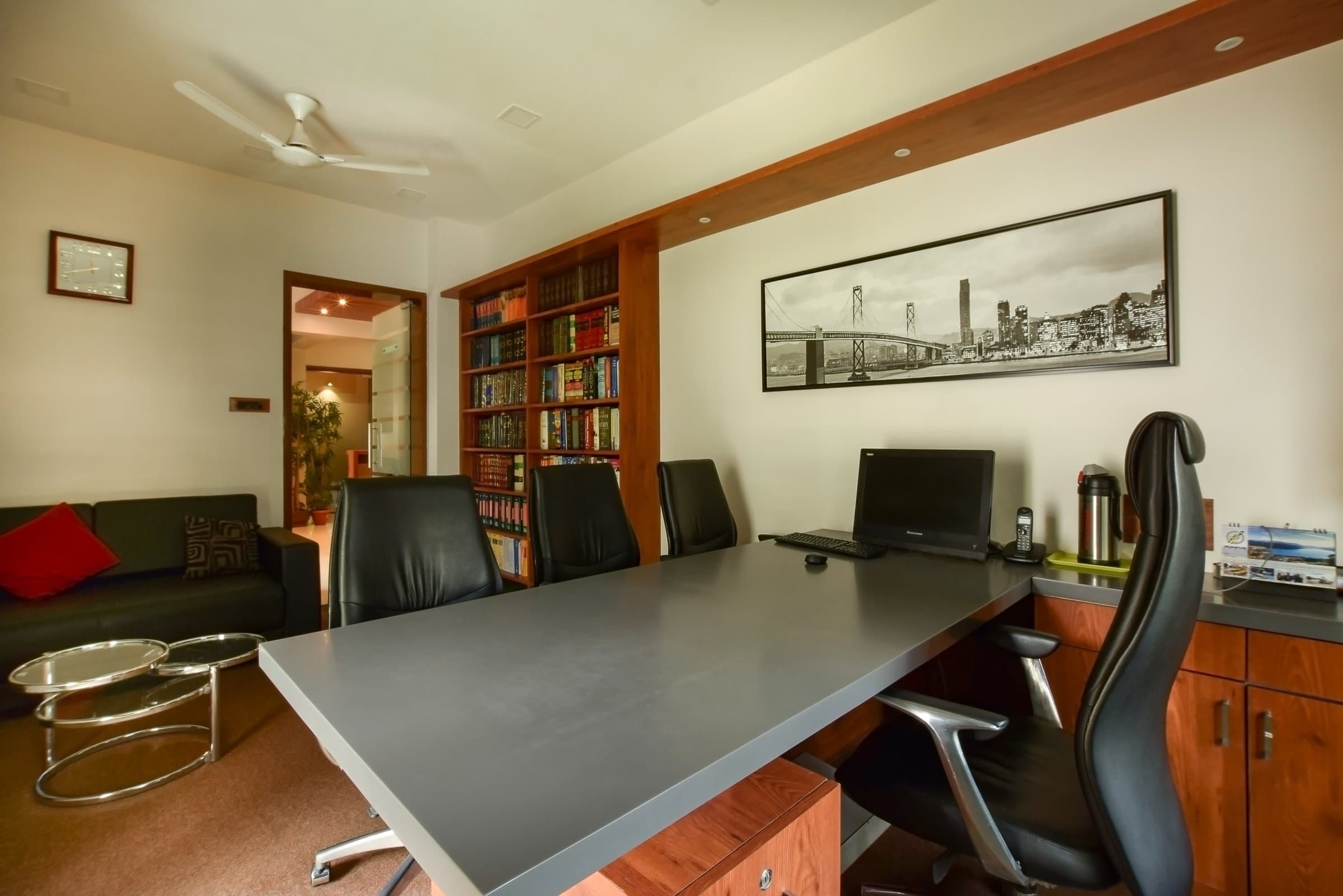 One chamber breaks from tile to carpet in this wood-slat law office — photo 4 of 8