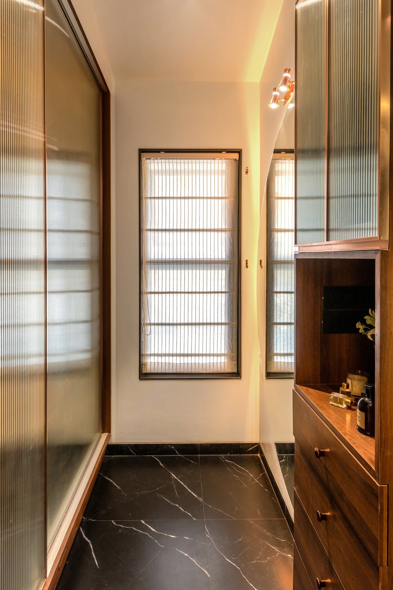 A 700 sq. ft. bedroom where storage disappears into every corner — photo 13 of 23