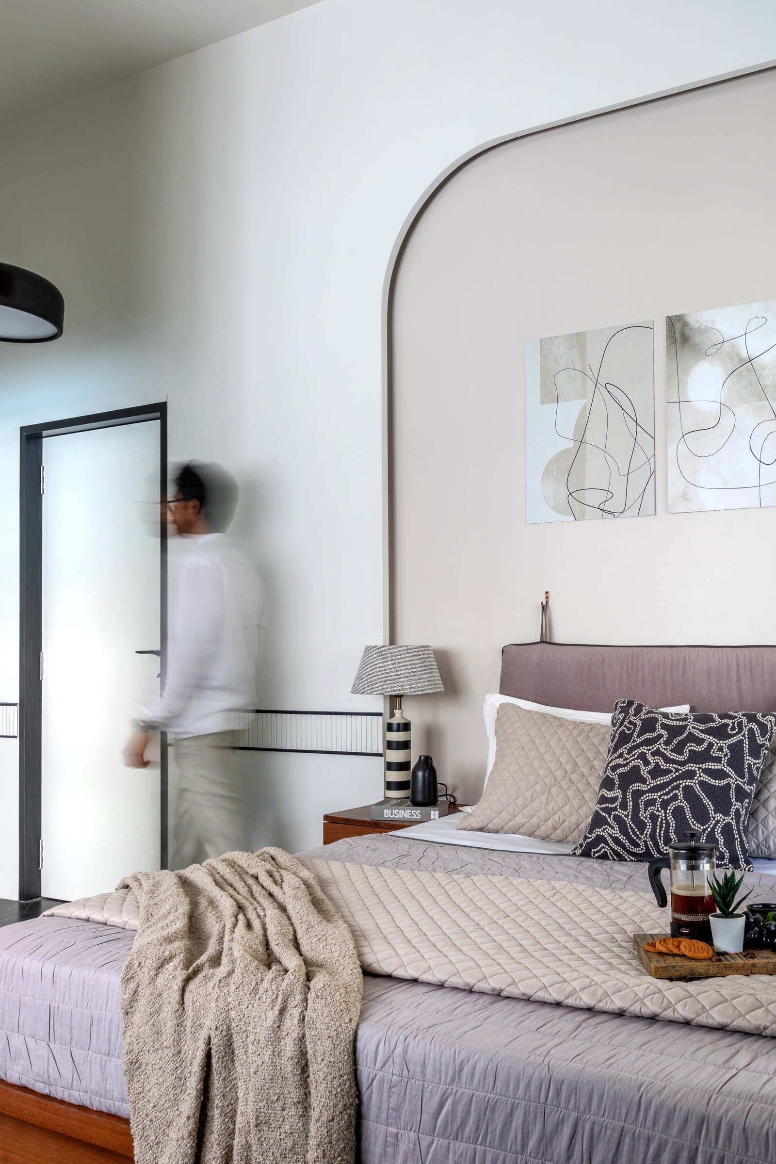 A 700 sq. ft. bedroom where storage disappears into every corner — photo 6 of 23